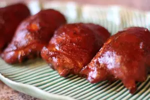 barbecue chicken thighs on the grill